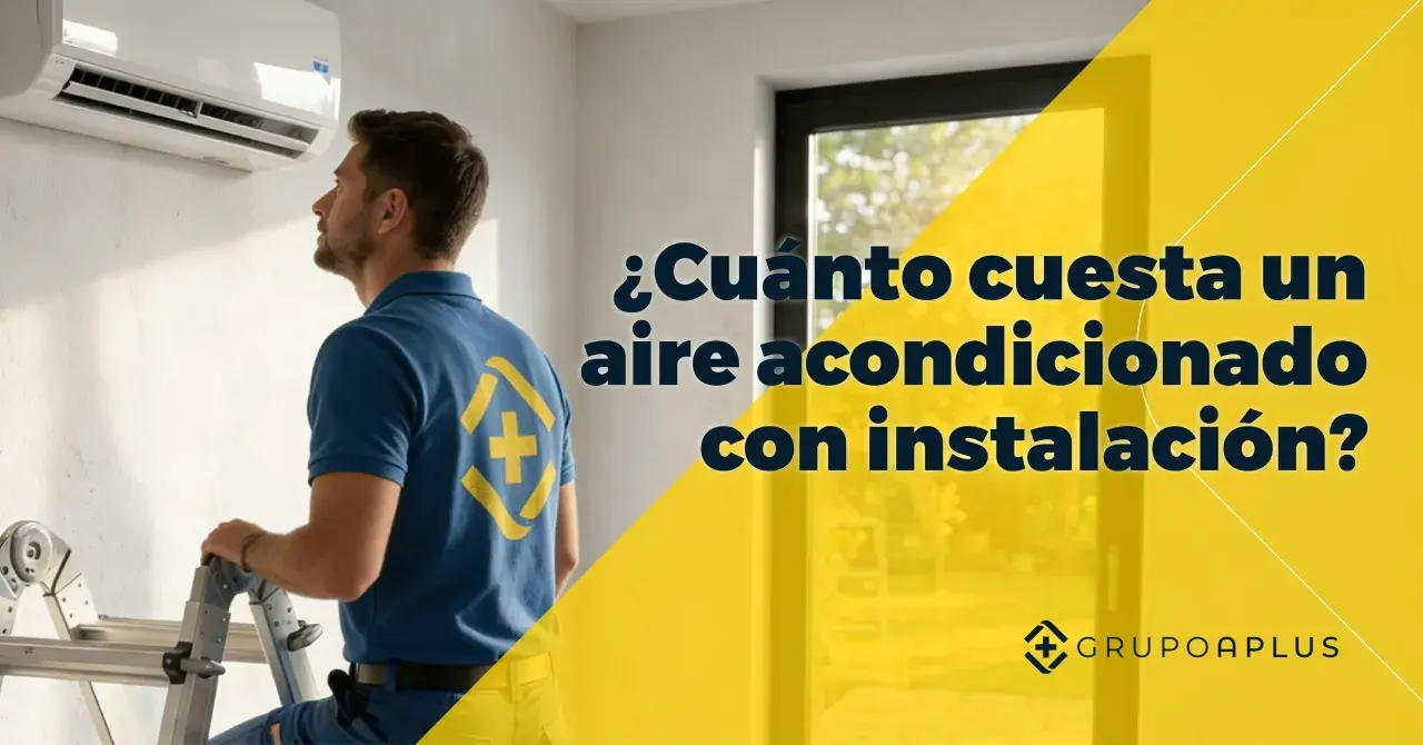 Técnico revisa unidad de aire acondicionado en escalera. ¿Cuánto cuesta un aire acondicionado con instalación?